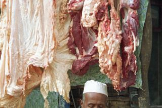 47 Kashgar Sunday Market 1993 Man Making Meat Dumplings